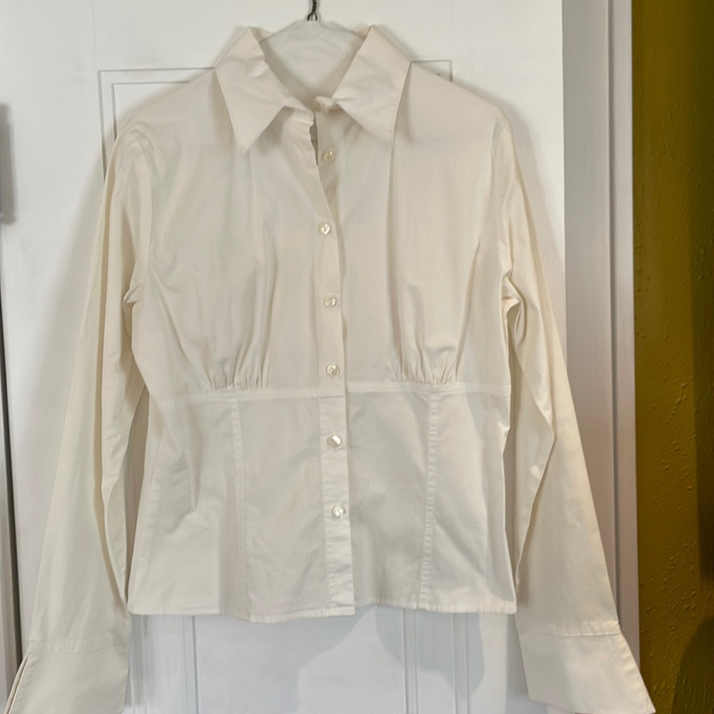 White blouse the pearl buttons empire bodice.